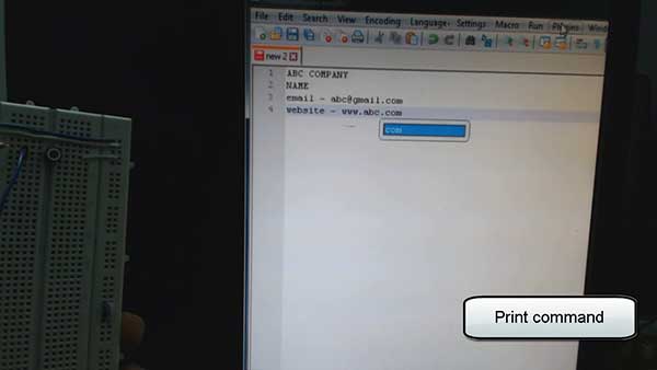 Image showing business information printed on Terminal application from USB Business Card
